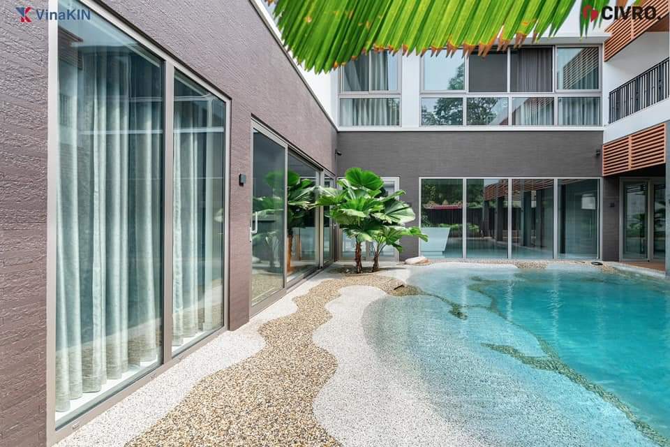 Thi công cửa nhôm kính tòa nhà biệt thự